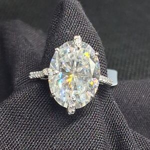 Stunning 12.48ctw Oval Cut Moissanite in Crown Setting